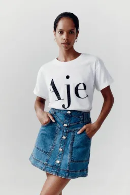 Aje Belmond Mini Skirt in Denim Blue Size 8 and Logo Tee White Print Size 6 Set for rent on The Volte - image 1