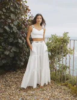 Aje Bardot Logo Tiered Midi Skirt White Size 6 for rent on The Volte - image 1