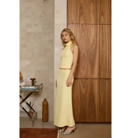 With Harper Lu Textured Halter Top and Maxi Skirt in Limoncello Set Size M / AU 10 for rent on The Volte - image 2
