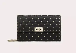 Valentino Rockstud Spike Clutch in Black for rent on The Volte - image 1