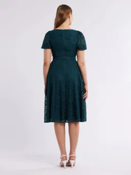 Review Emerald Short Puff Sleeves Avette Lace Knee Length Dress Green Size 12 for rent on The Volte - image 4