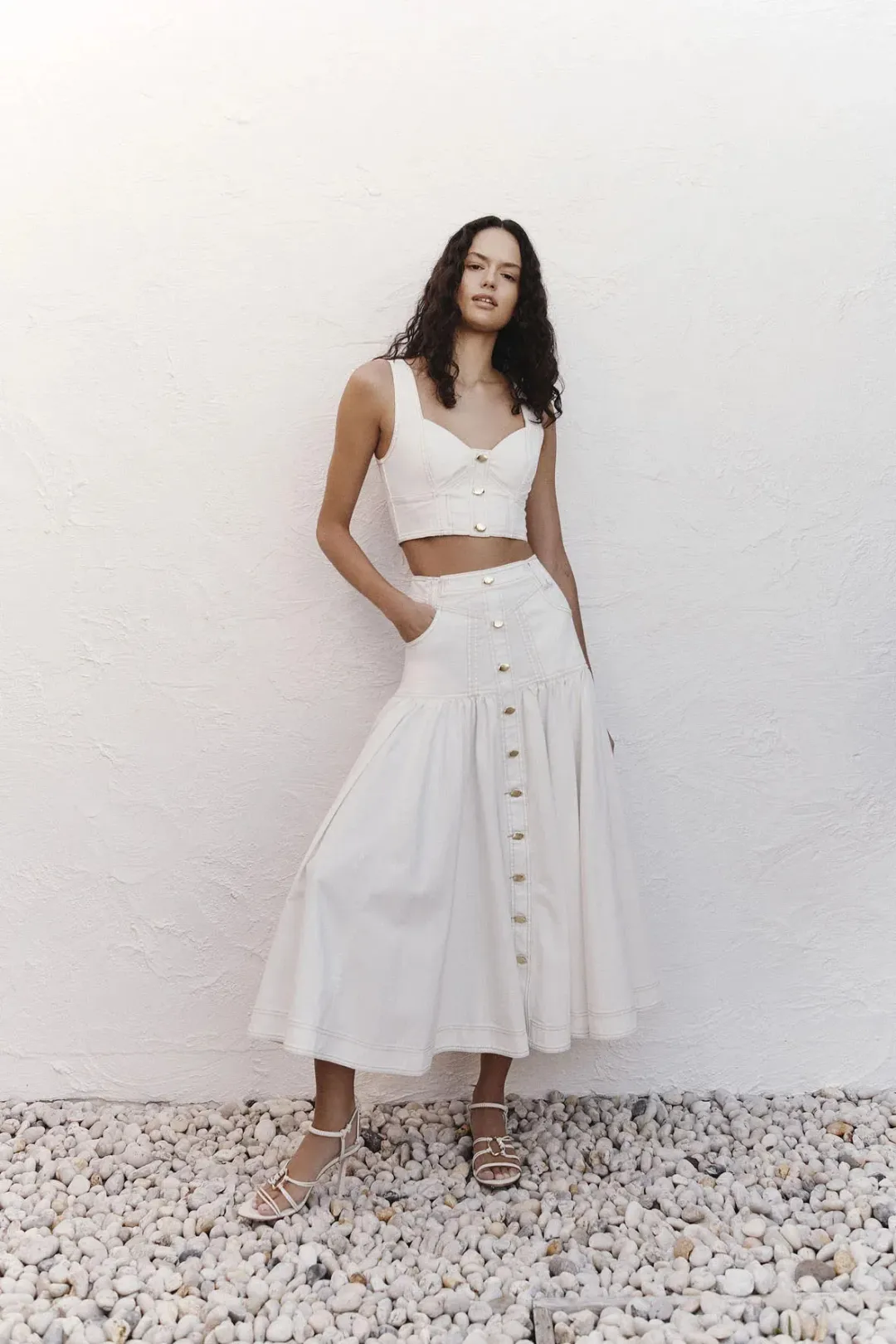 Aje Elena Denim Cropped Bustier Size 8 and Belmond Denim Midi Skirt Size 6 Set in Ivory for rent on The Volte - main image