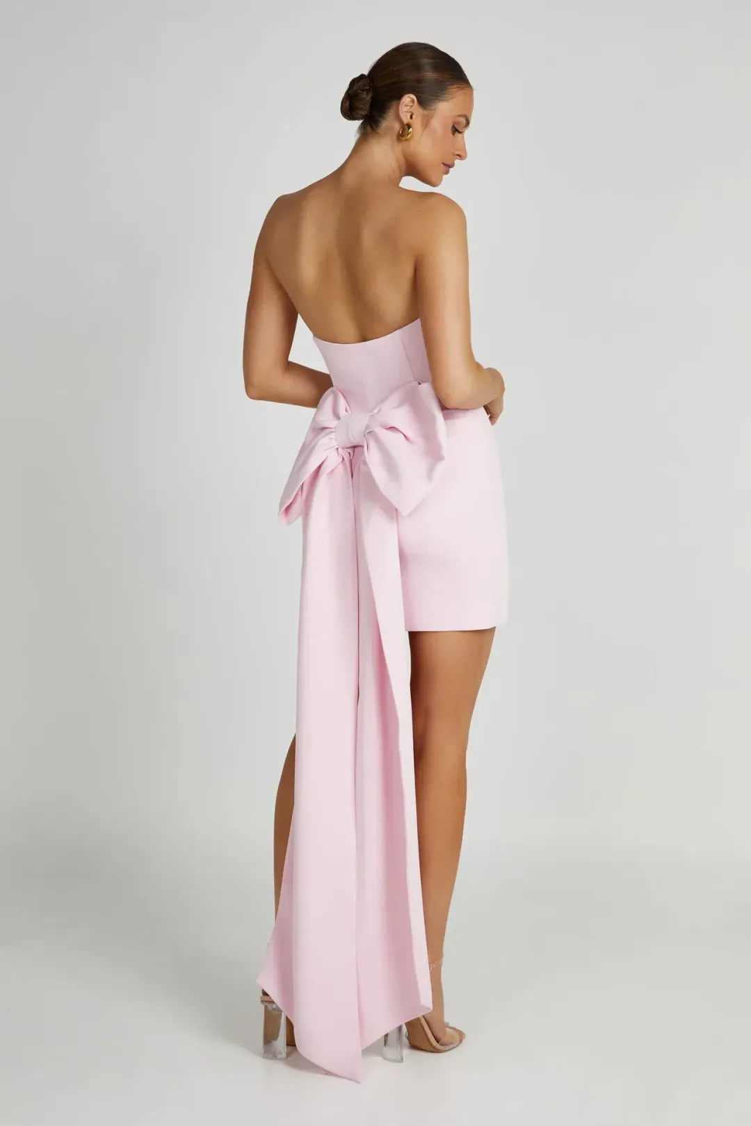Meshki Meredith Strapless Bow Mini Dress in Blush Pink Size XS / AU 6 for rent on The Volte - main image
