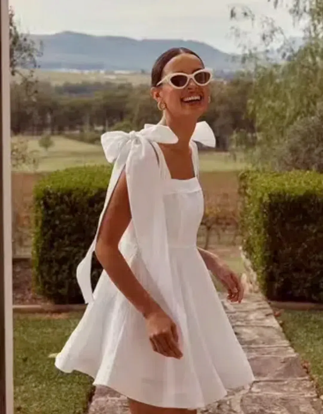 Dissh Aisle Linen Bow Mini Dress White Size 6 for rent on The Volte - main image