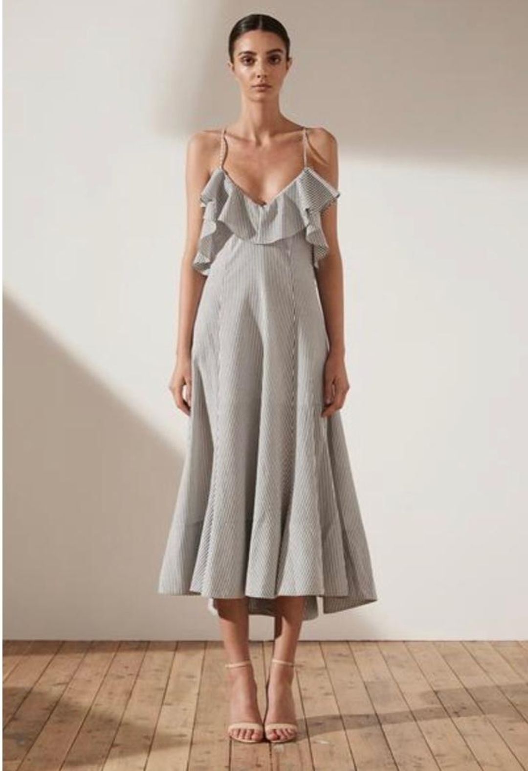 Sabbia ruffle midi dress in charcoal for rent on The Volte - main image