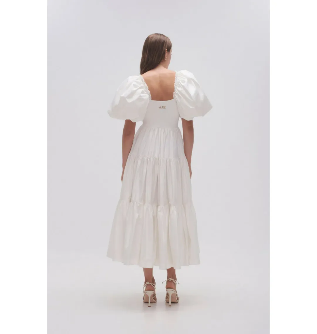 Aje Casa Puff Sleeve Midi Dress in Ivory Size AU 14 for rent on The Volte - main image