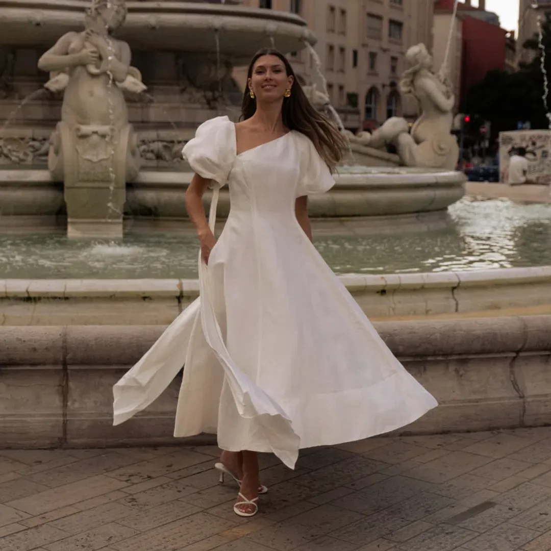 Aje Arista Asymmetrical Tulip Sleeve Midi Dress Ivory Size 8 for rent on The Volte - main image