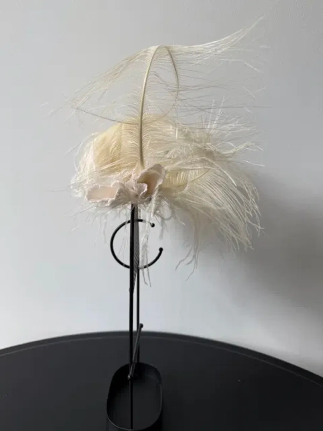 Morgan and Taylor Delicate Feather Fascinator Cream for rent on The Volte - main image