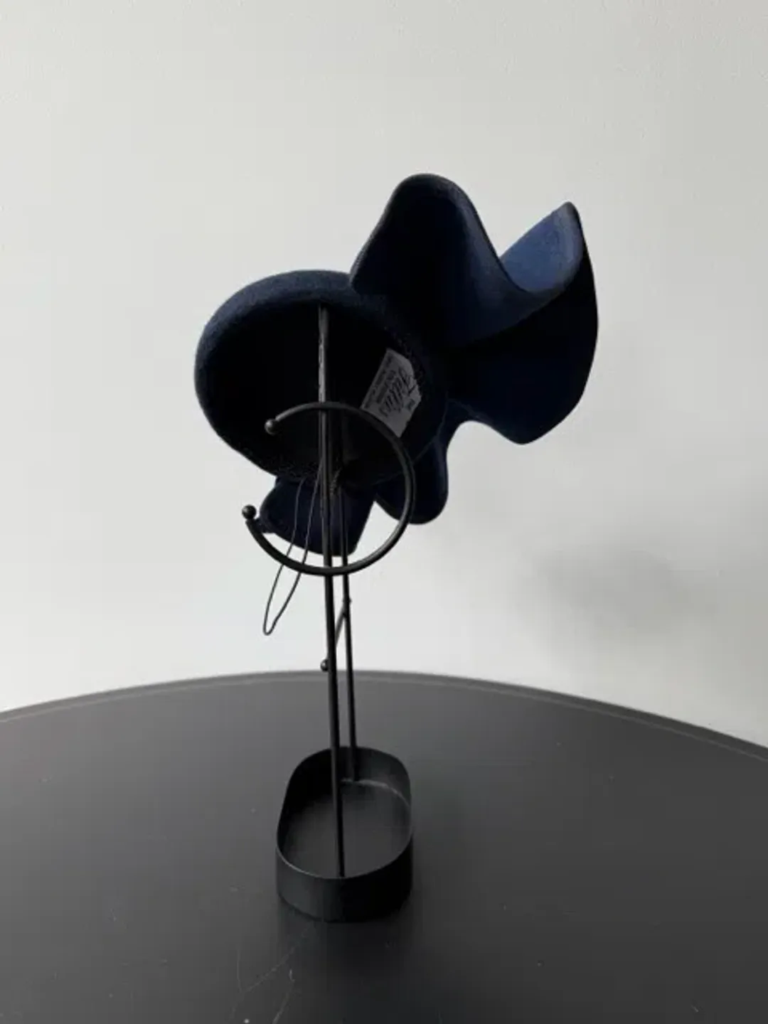 Felted Wool Headpiece with Sculptural Detail and Floral Velvet Adornment Navy One Size for rent on The Volte - main image