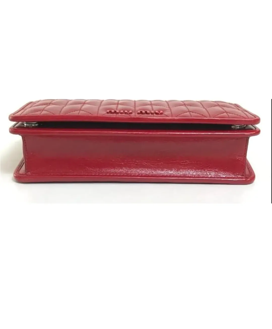 Miu Miu Matelasse Flap Clutch with removable strap Red for rent on The Volte - main image
