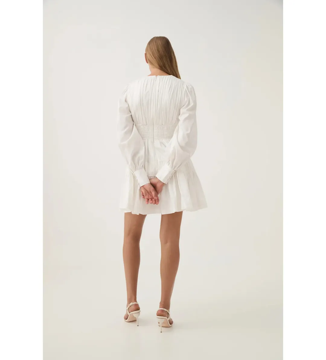 Aje Fallingwater Ruched Mini Dress in Ivory Size AU 14 for rent on The Volte - main image