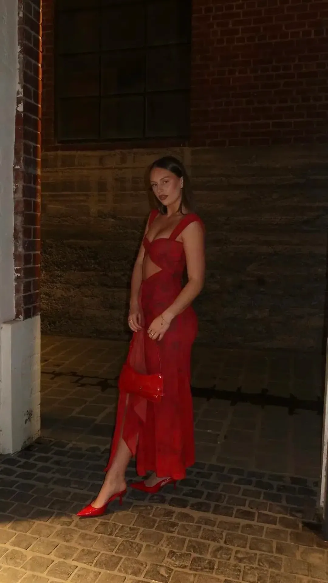 She is OLLÁ Imogen Maxi in Cherry Red Size 8 for rent on The Volte - main image