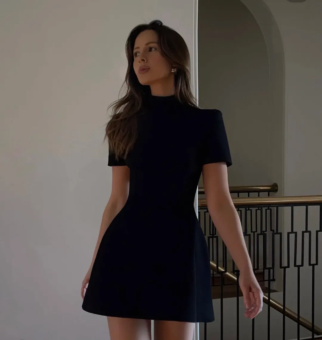 Scanlan Theodore Crepe Knit Peplum Mini Dress Black Size S / AU 8 for rent on The Volte - main image