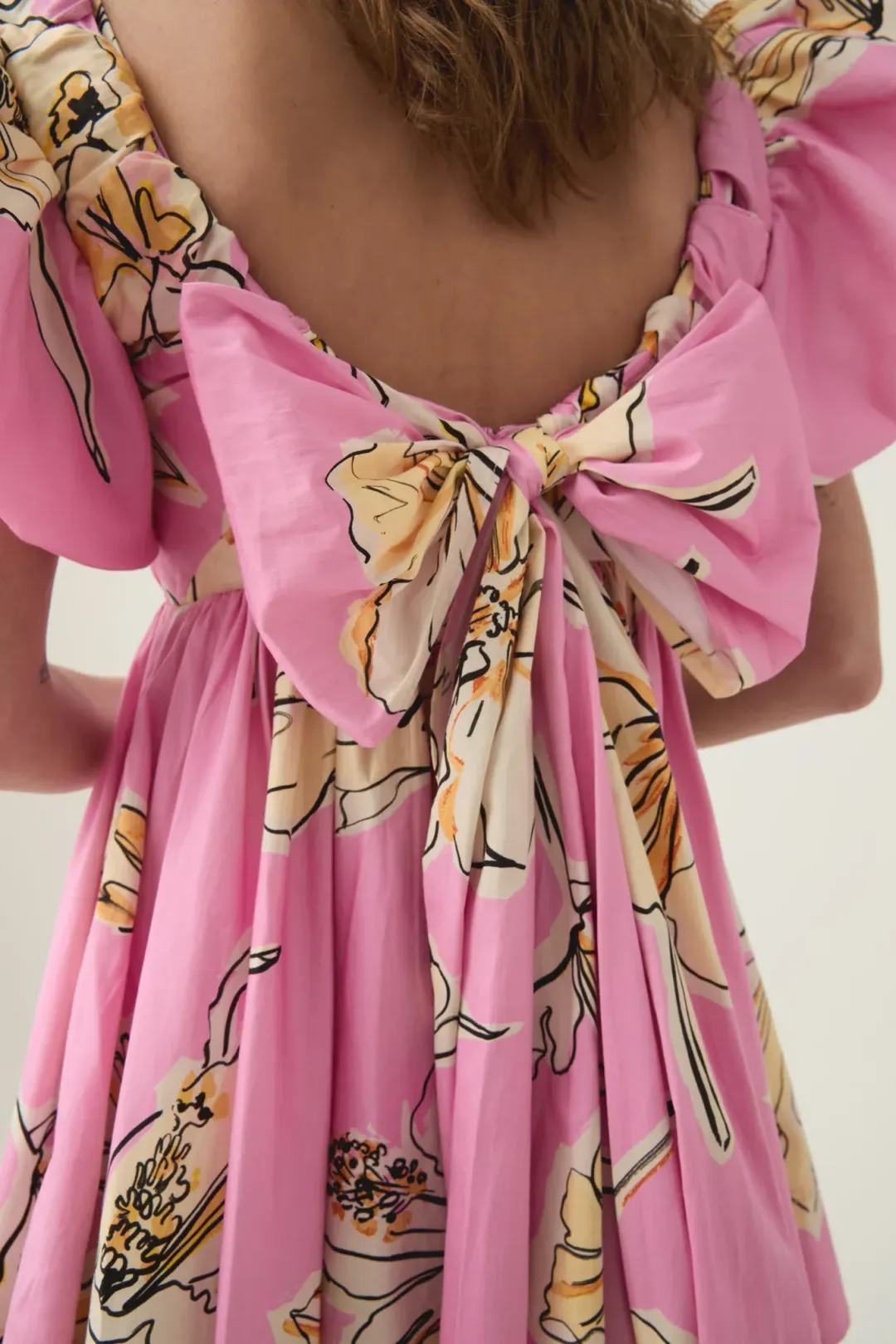 Aje Gretta Bow Back Mini Dress Pink Hibiscus Size AU 14  for rent on The Volte - main image