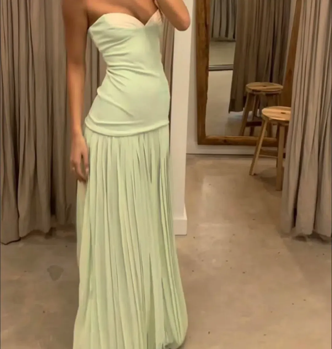 She is OLLÁ Nicolette Maxi Dress Green Size 8  for rent on The Volte - main image