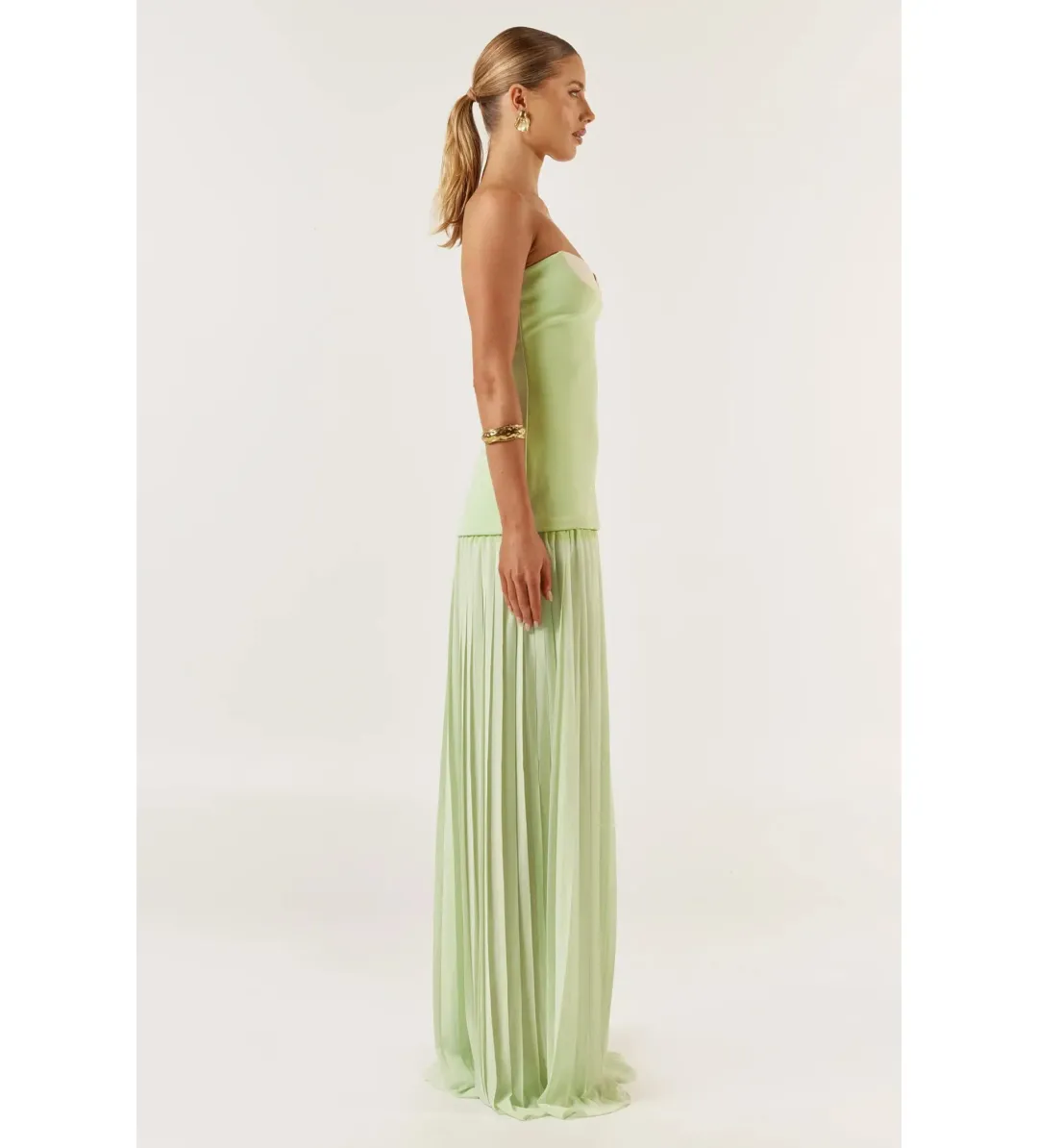 She is OLLÁ Nicolette Maxi Dress Green Size M/AU 10 for rent on The Volte - main image