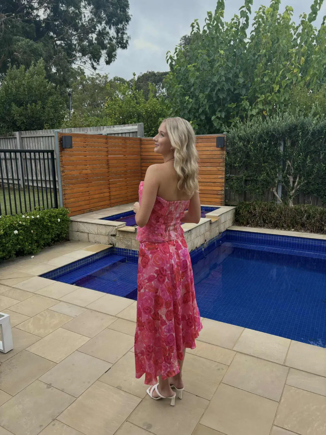 Aje Charmed Rosette Ruffle Bustier with Valeria Asymmetrical Midi Skirt in Misty Rose Size 6 for rent on The Volte - main image