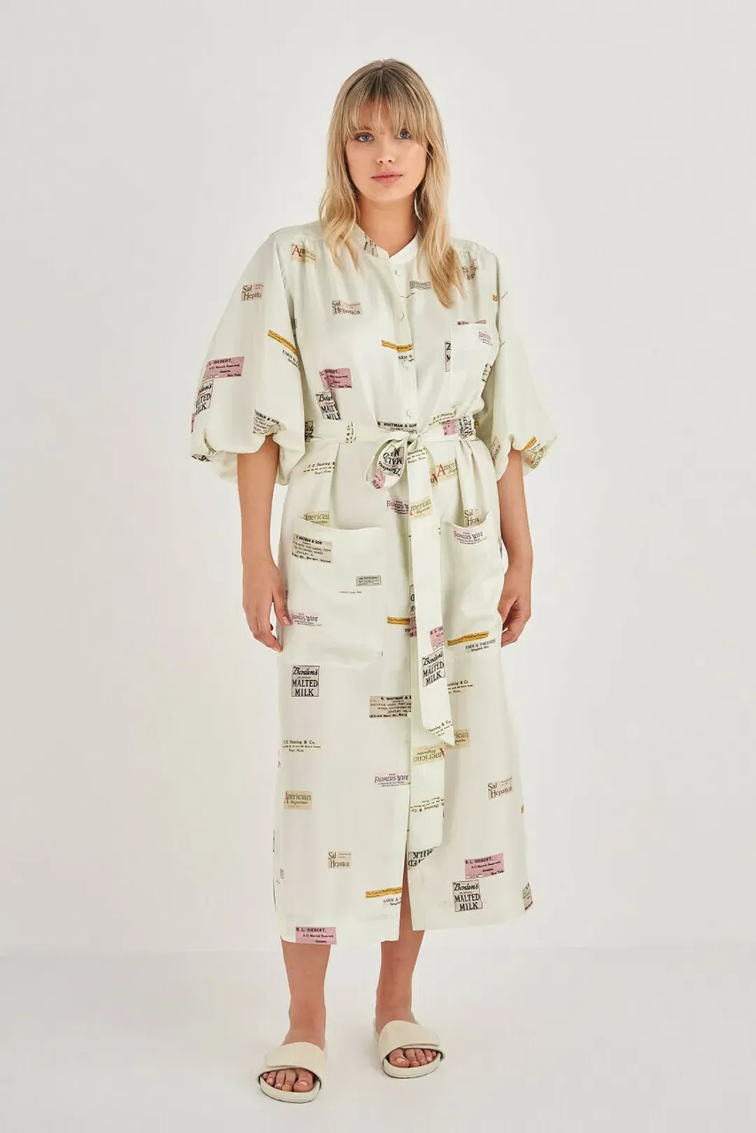 Oroton Short Sleeve Spaced Label Midi Dress  Beige Size 8  for rent on The Volte - main image