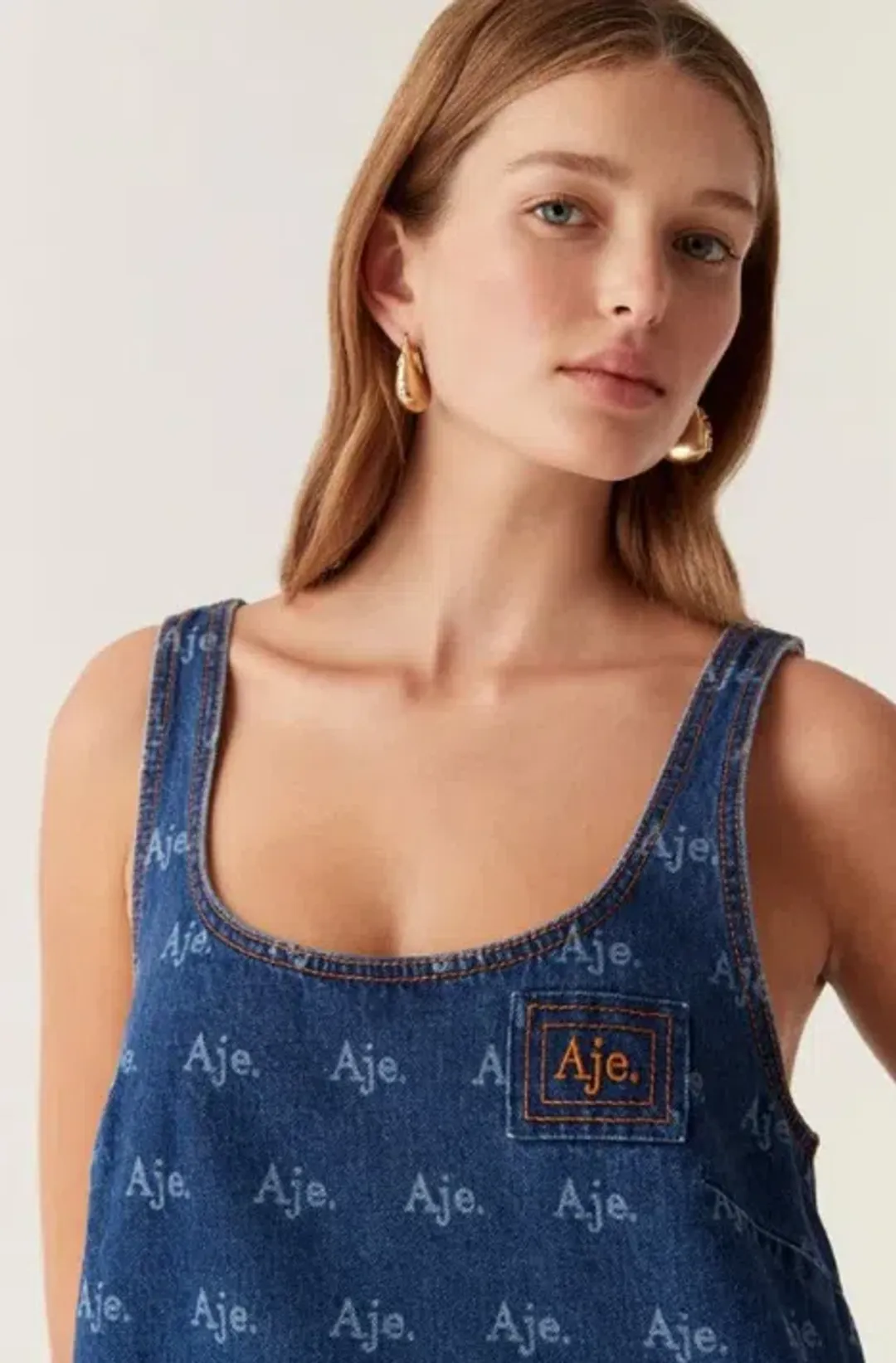 Aje Ratio Logo Mini Dress in Blue Size AU 10 for rent on The Volte - main image