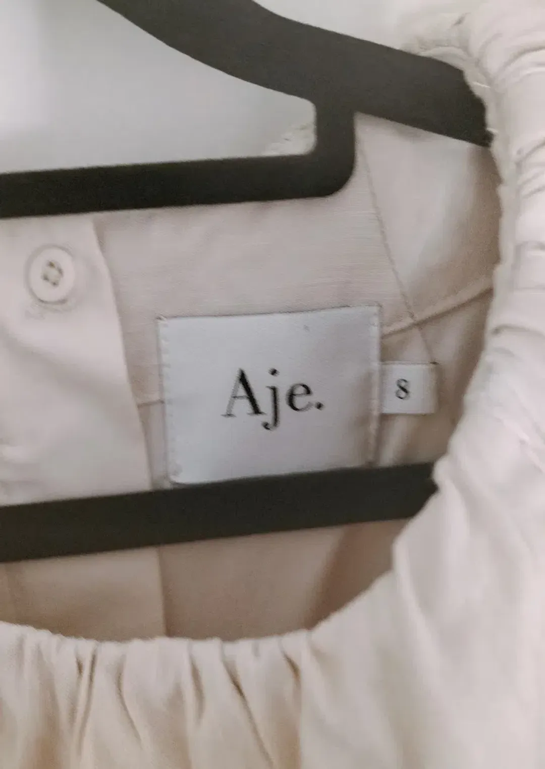 AJE Euphoria Linen Puff Sleeve Cut Out Stone Midi Dress  for rent on The Volte - main image