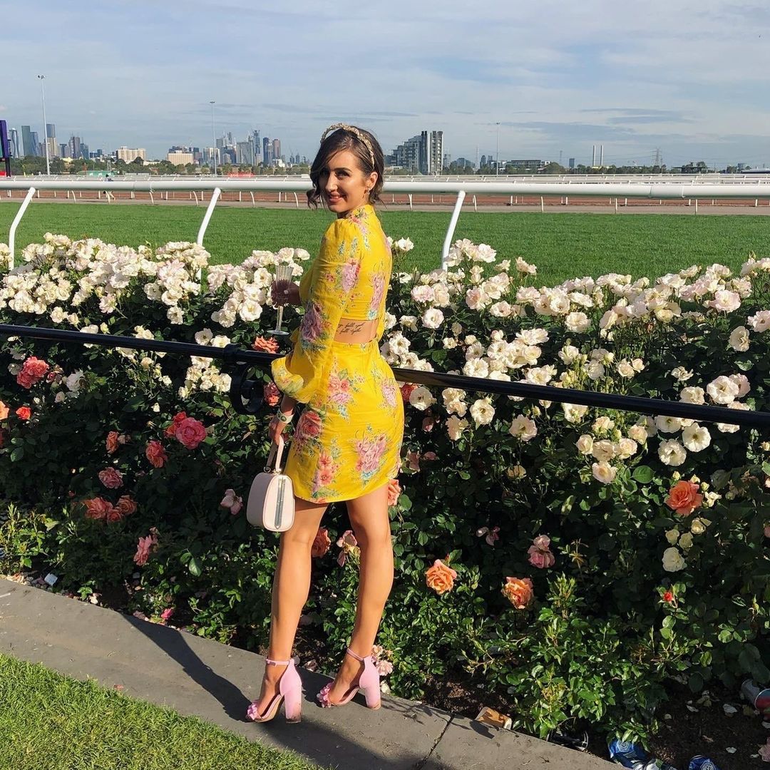 Zimmermann Zinnia Bow Cut Out Short Dress in Golden Floral Size 8 for rent on The Volte - main image