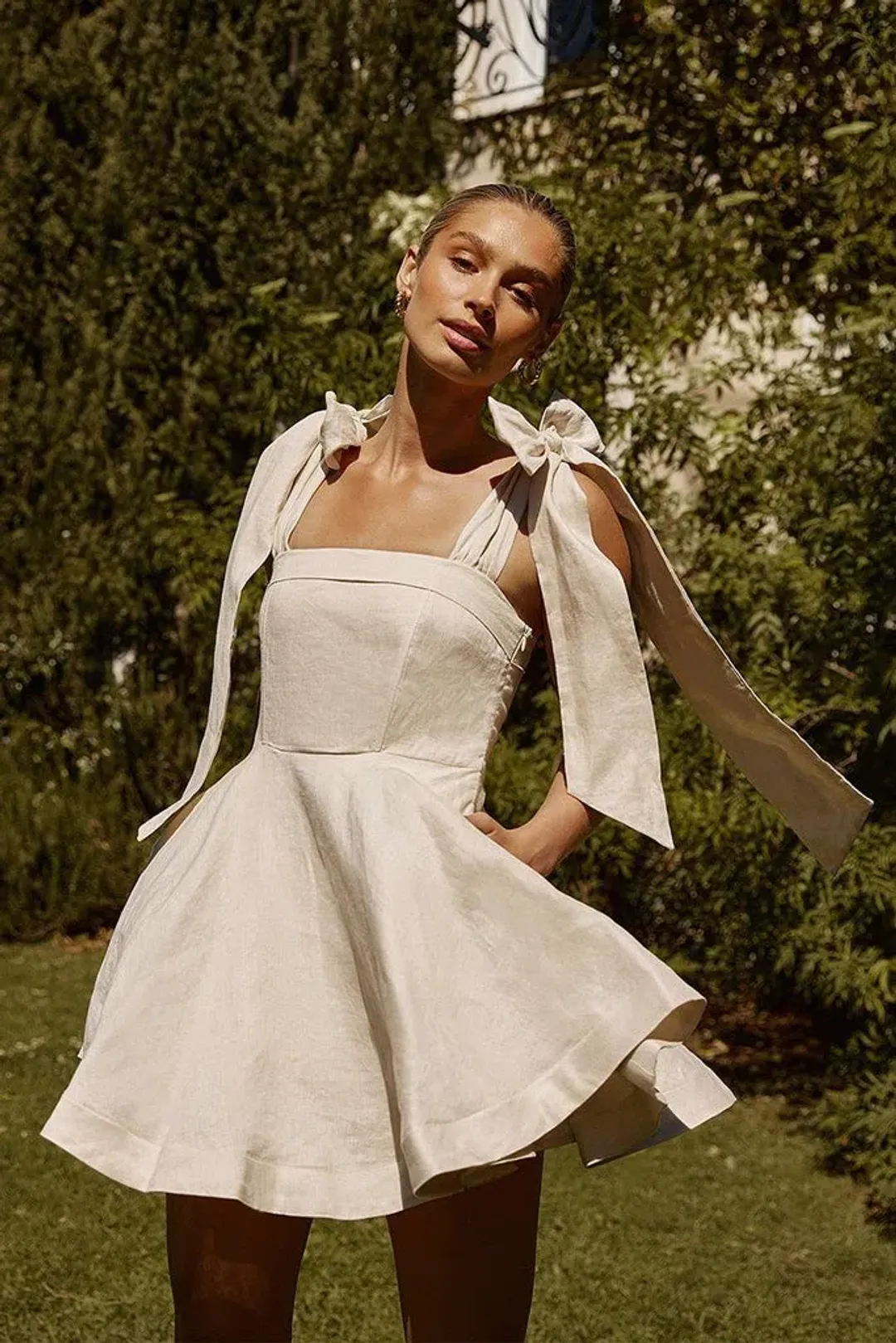 Dissh Aisle Pearl Linen Bow Mini Dress Cream Size 8 for rent on The Volte - main image