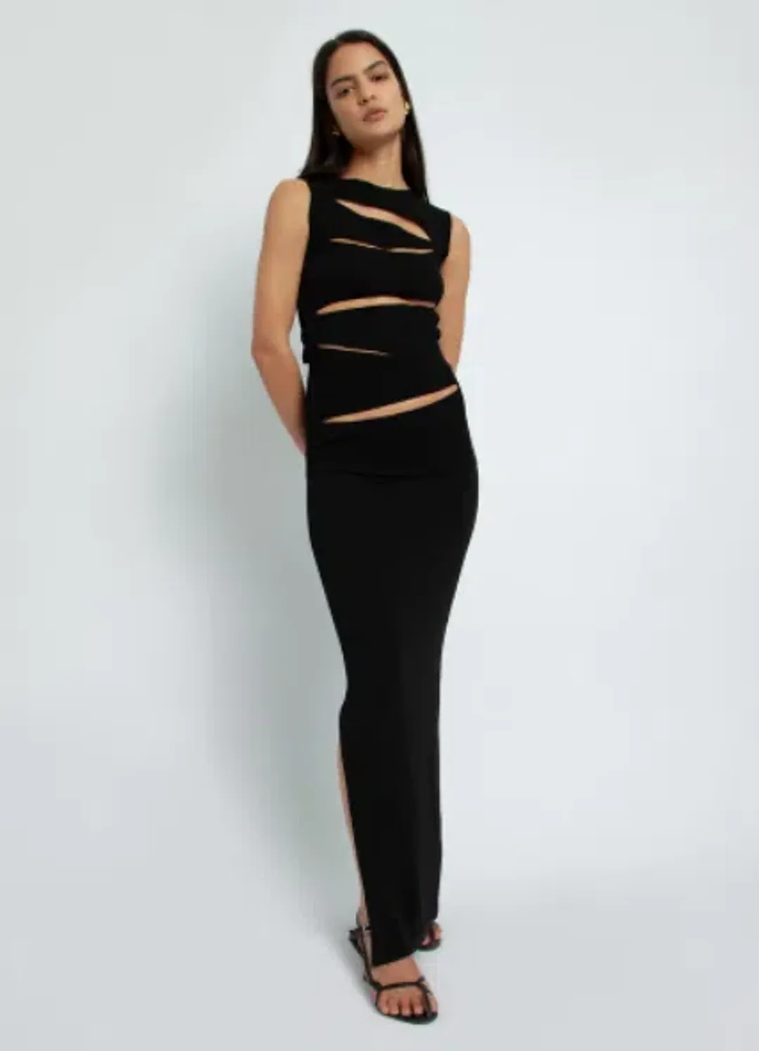 Christopher Esber Slashed Knit Dress Black Size 8 for rent on The Volte - main image