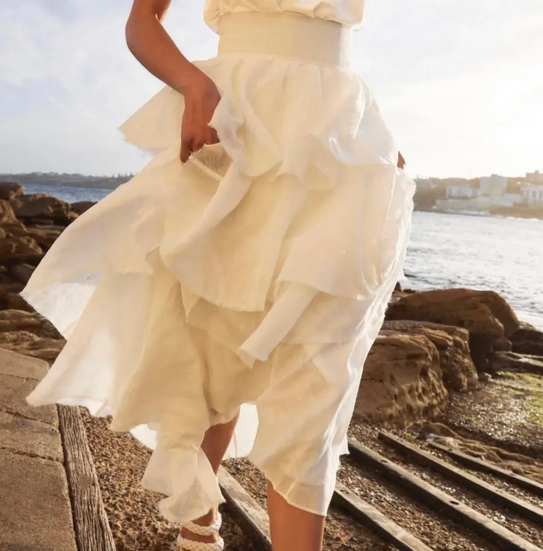 Aje Medina Tiered Midi Skirt White Size 12  for rent on The Volte - main image