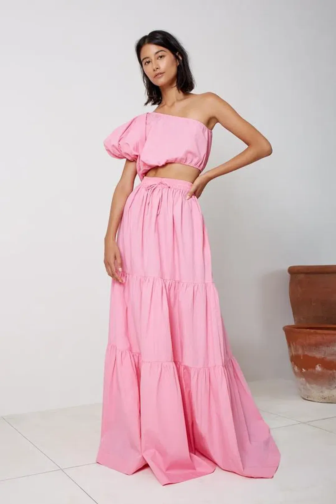 SWF One Shoulder Puff Sleeve Crop and Drawstring A-Line Tiered Maxi Skirt Set in Floss Pink Size 10 for rent on The Volte - main image