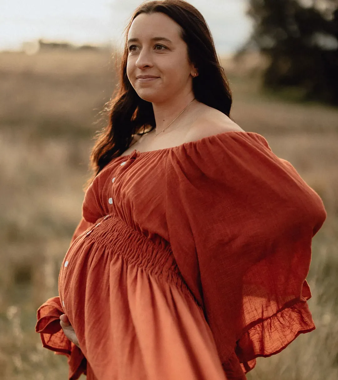 We Are Reclamation Ruffle Me Open Gown in Rust One Size Fits Most  for rent on The Volte - main image