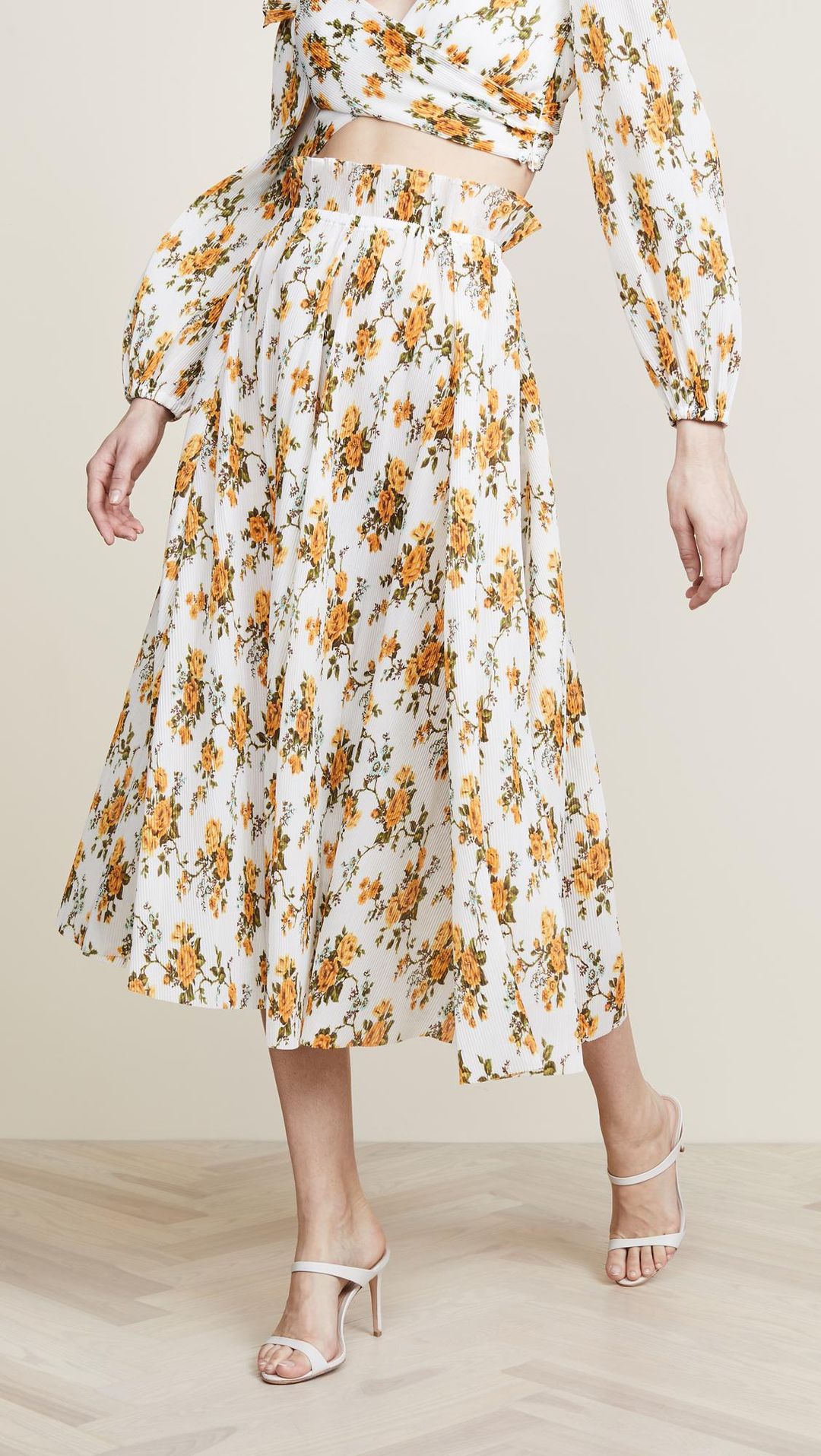 Zimmermann Golden Plisse Skirt for rent on The Volte - main image