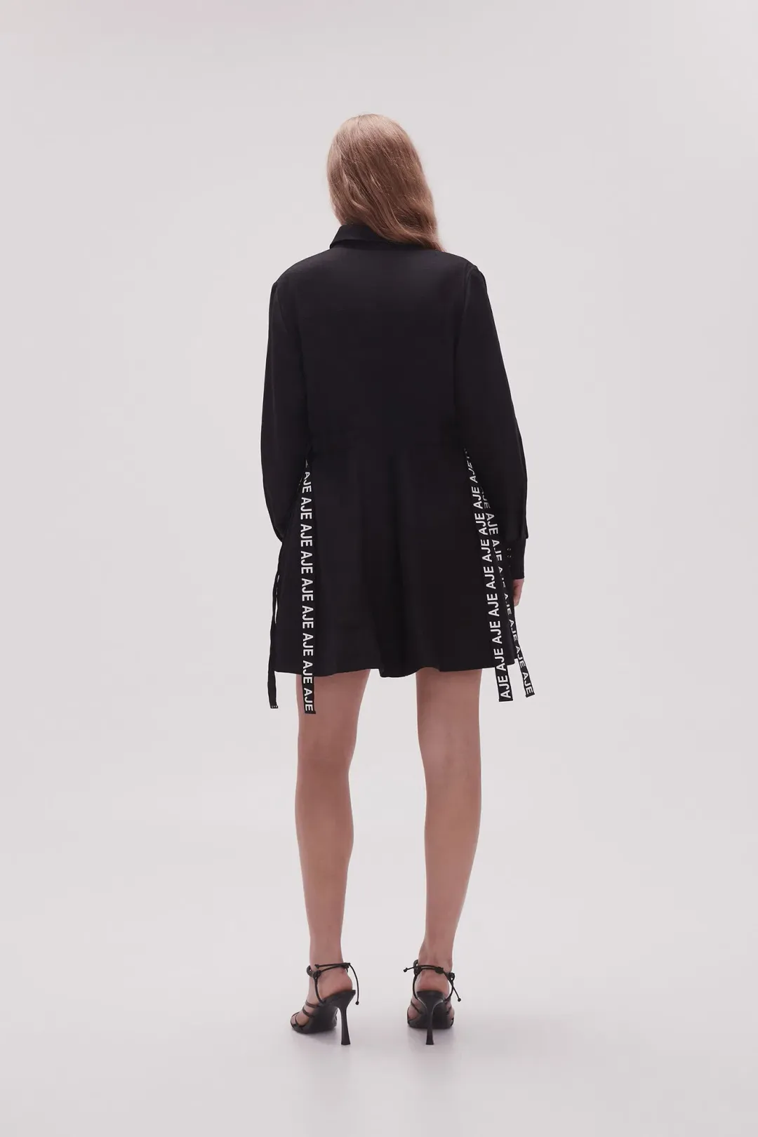 Aje Eternal Logo Mini Dress Black Size 16 for rent on The Volte - main image