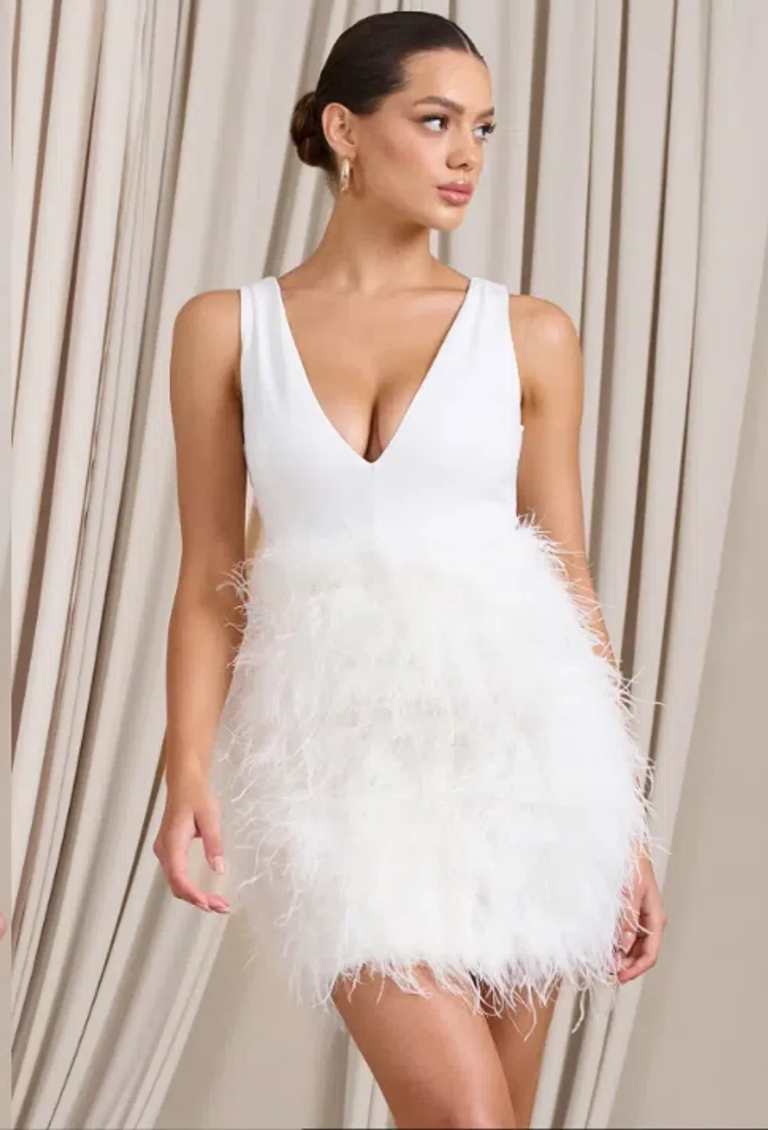 Club L London Flirt  Plunge Front Mini Dress with Feather Skirt White Size 4  for rent on The Volte - main image