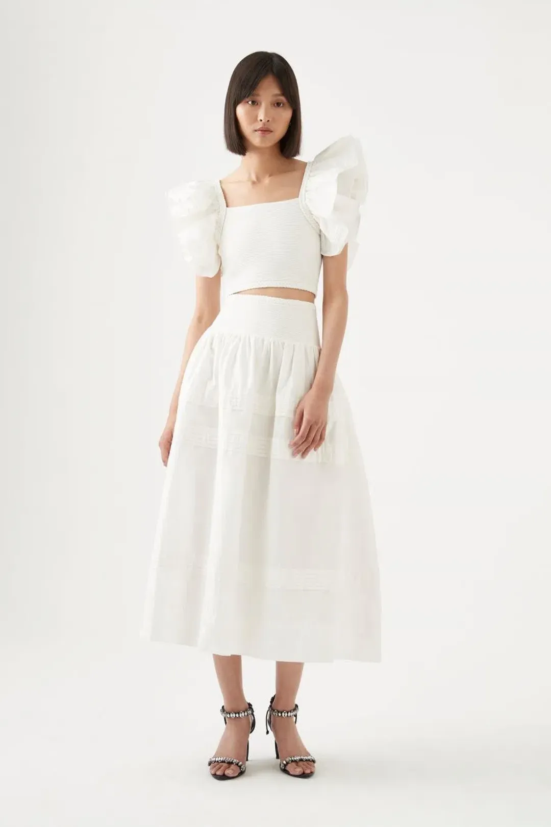 Aje Corinne Knit Bodice Crop Top and Rosalie Knit Waist Midi Skirt Set in Ivory Size XL / AU 16 for rent on The Volte - main image