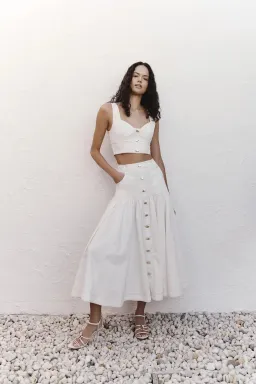 Aje Elena Denim Cropped Bustier Size 8 and Belmond Denim Midi Skirt Size 6 Set in Ivory for rent on The Volte - image 1