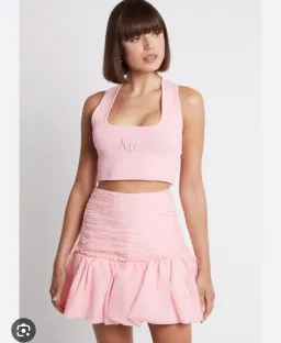 Aje Myriad Pink Tiered Mini Skirt for rent on The Volte - image 1