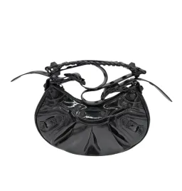 Balenciaga Le Cagole Patent Leather Handbag for rent on The Volte - image 1