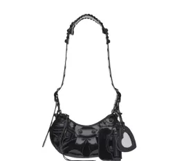 Balenciaga Le Cagole Patent Leather Handbag for rent on The Volte - image 2