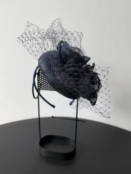 Millinery Headpiece With Raffia Flowers and Veil for rent on The Volte - image 1