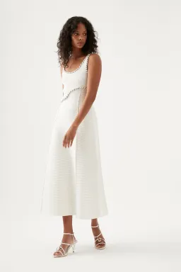 Aje Carve Abstract Knit Midi Dress in Ivory Size 10 for rent on The Volte - image 1