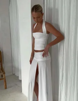 Mode Mila Kai Halter & Remi Skirt Set in size small  for rent on The Volte - image 1