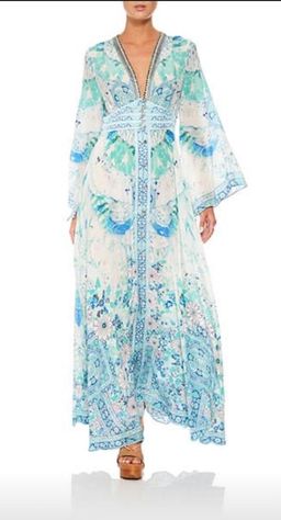 Camilla ‘Head in the Clouds’ size M for rent on The Volte - image 1