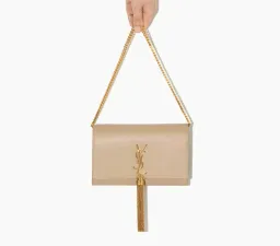 Saint Laurent Kate Textured Leather Handbag with Gold Tassel Beige for rent on The Volte - image 2