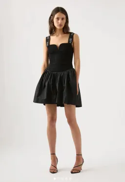Aje Mira Logo Strap Tulip Mini Dress Black Size XL / Au 14 for rent on The Volte - image 1
