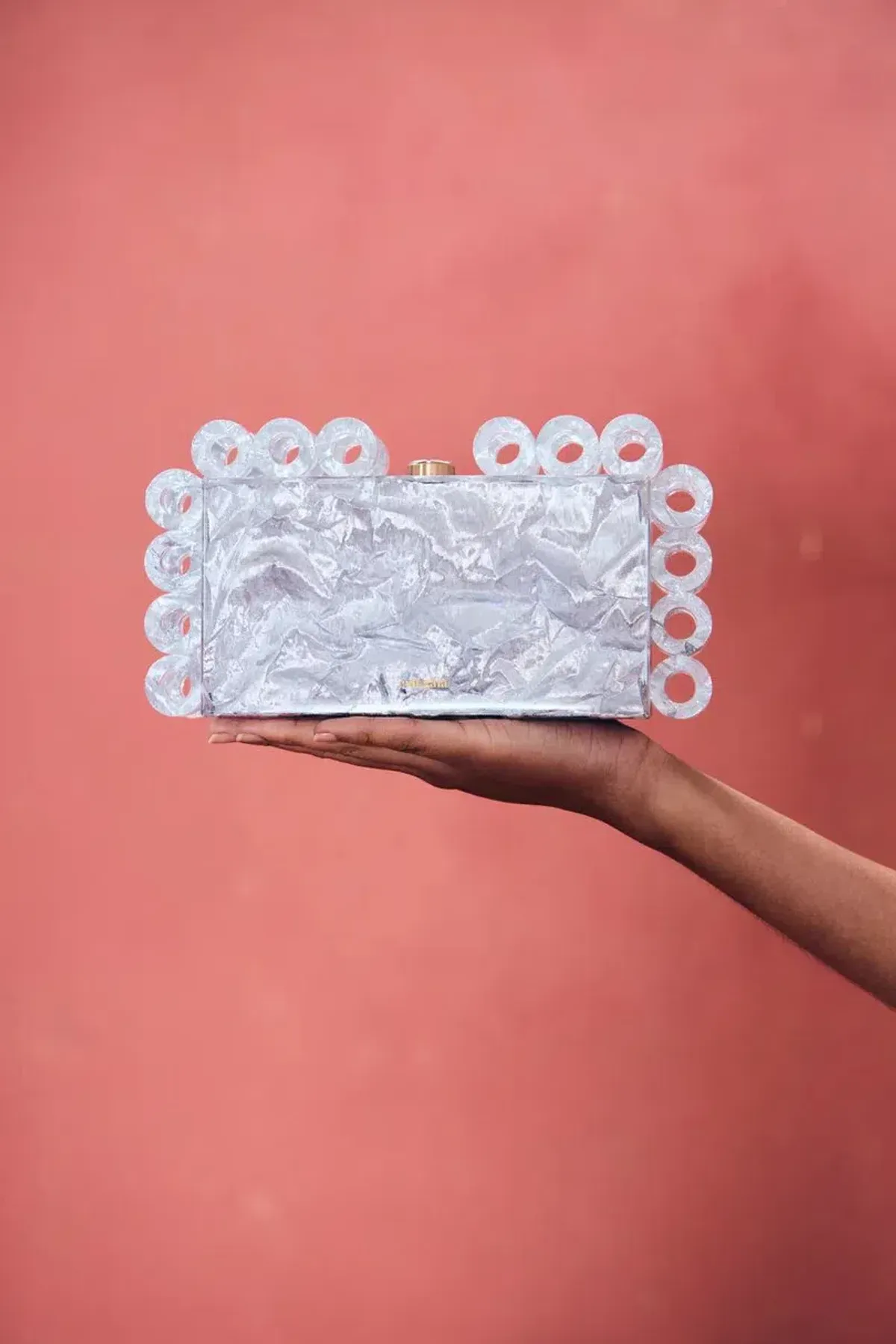 Cult Gaia Harlow Ring Crinkled Metallic Silver Clutch Bag for rent on The Volte - main image