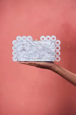 Cult Gaia Harlow Ring Crinkled Metallic Silver Clutch Bag for rent on The Volte - image 1