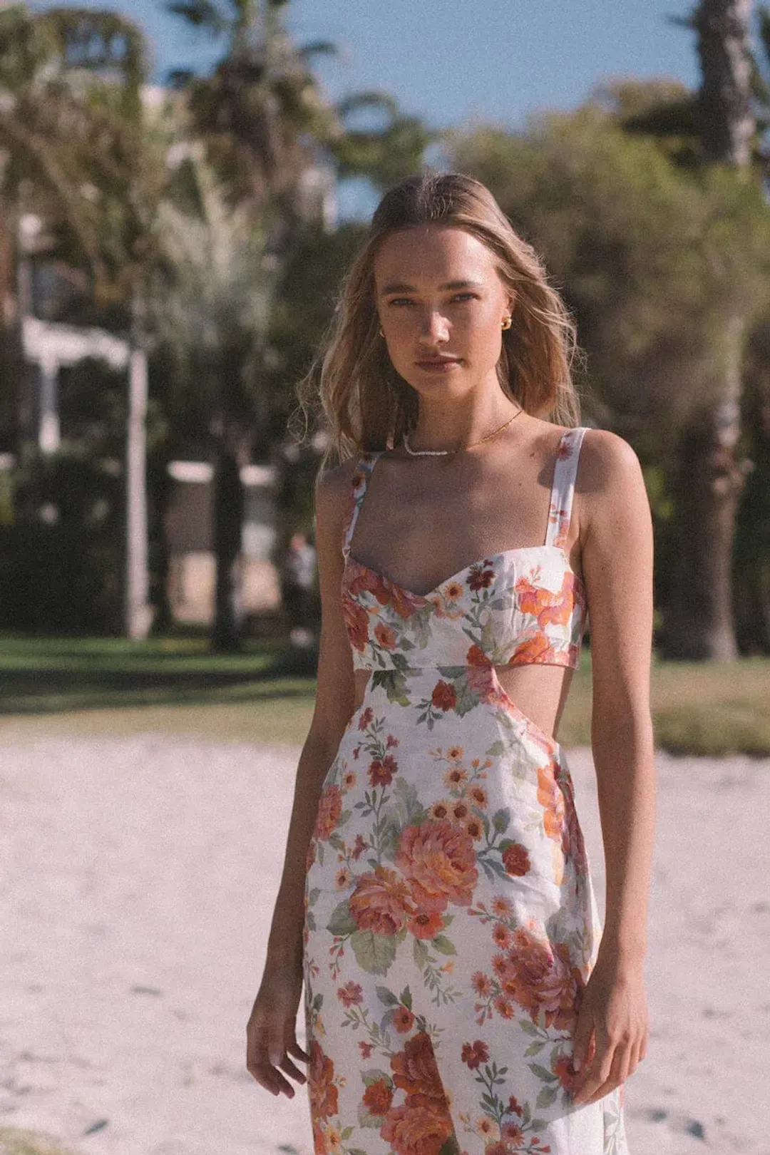 Sofia the Label Delilah Cut Out Midi Dress in Sunset Floral Size 8  for rent on The Volte - main image