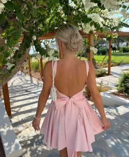 House of CB Florianne Bow Mini Dress in Soft Peach Size XS / AU 6 for rent on The Volte - image 2