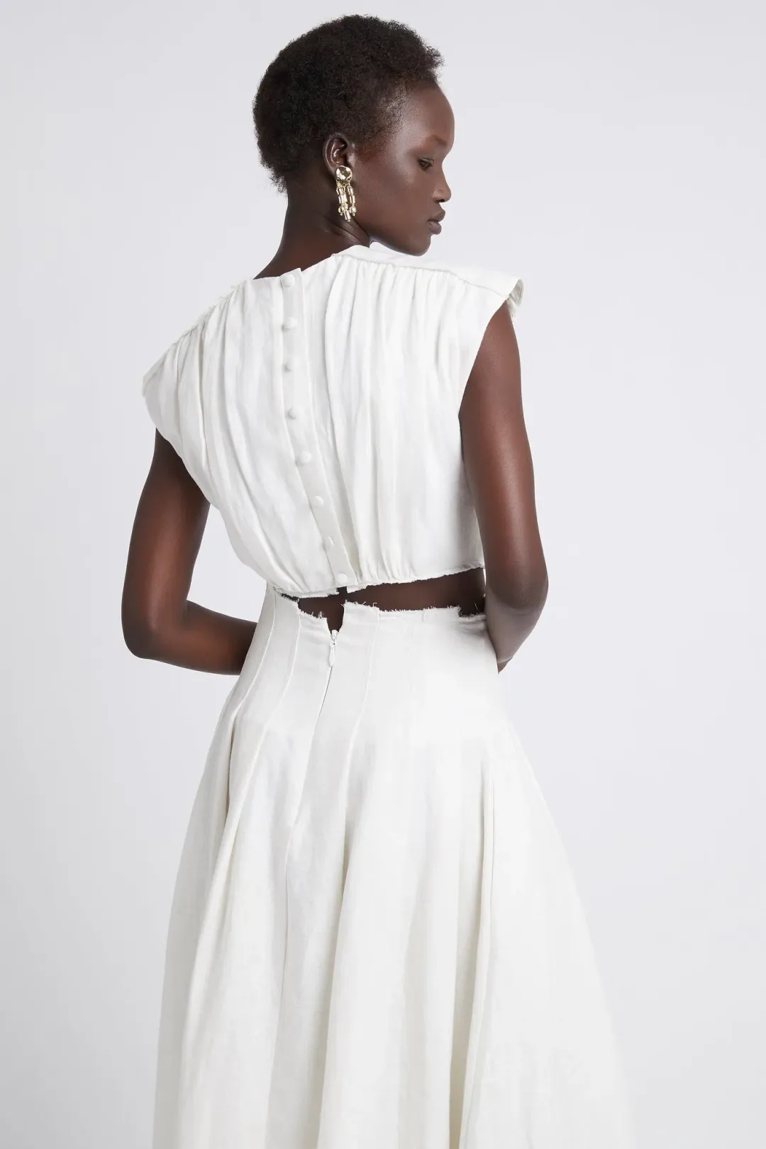 Aje Byblos Ring Cropped Top and Apres Midi Skirt Set Ivory Size 10 for rent on The Volte - main image
