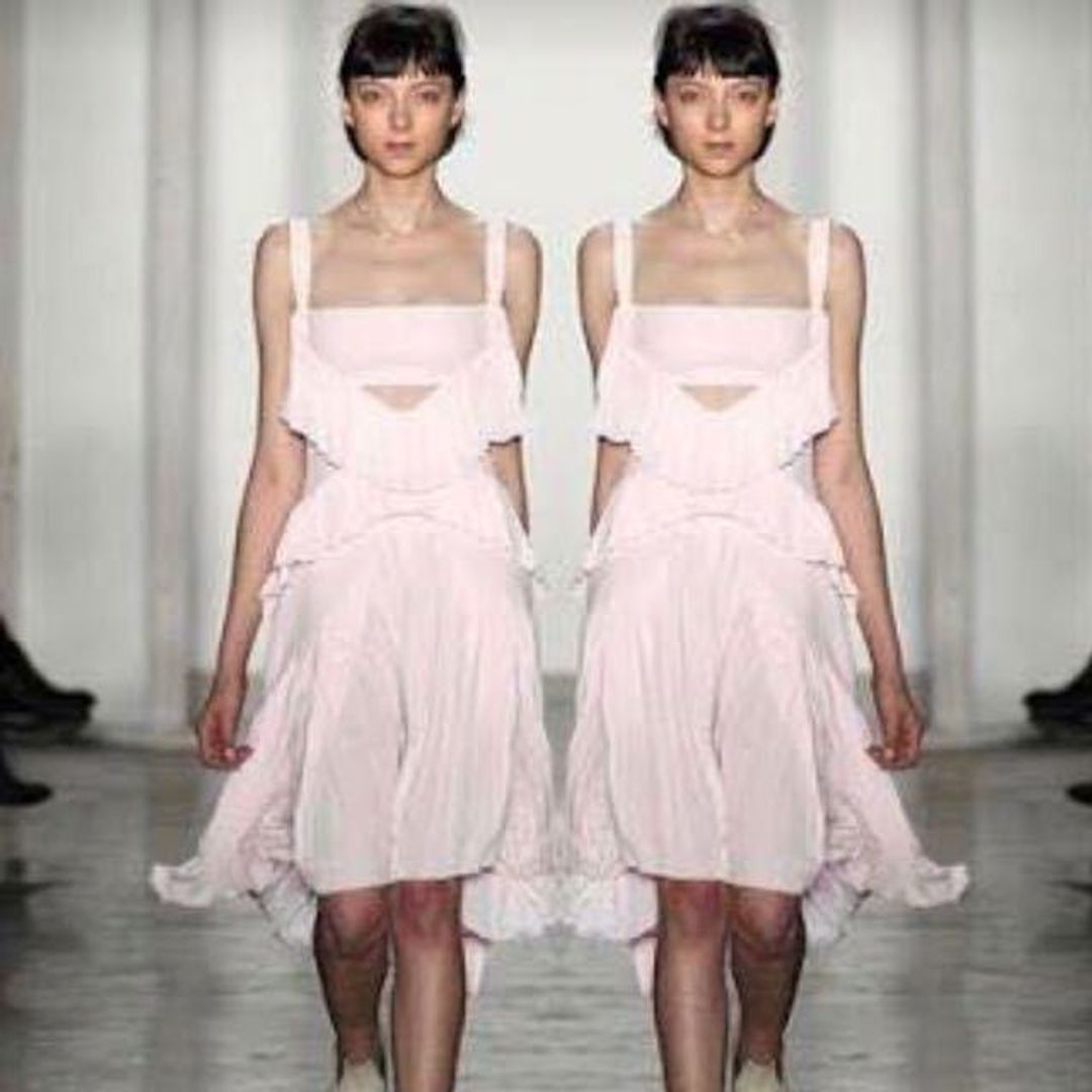 DION LEE -  "Broken Pinafore" Dress in Black with Pink strap (back) for rent on The Volte - main image